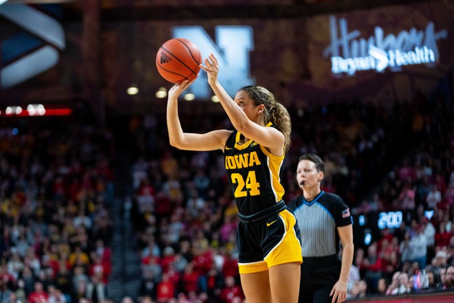 Iowa's Gabbie Marshall takes a shot from the corner during a game against Nebraska Sunday, Feb. 11, 2024, at Pinnacle Bank Arena.