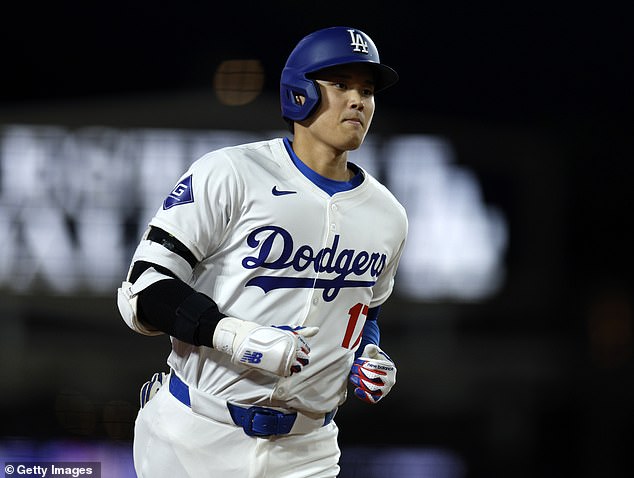 Dodgers fan who caught Shohei Ohtani's first home-run ball claims she was  PRESSURED by team to give $100,000 item back after LA 'threatened not to  authenticate it' for potential sale | Daily