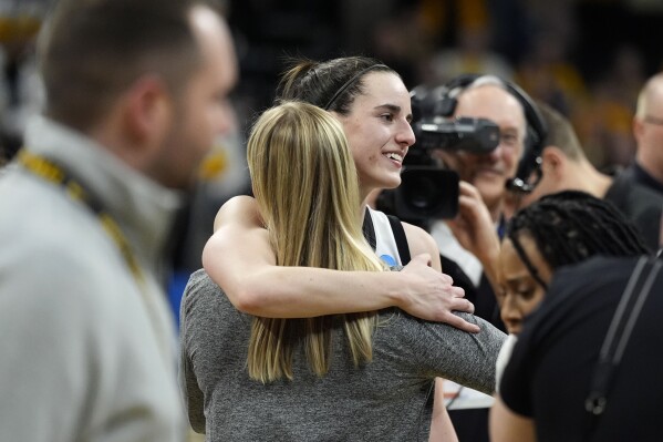 Iowa's Clark shows love for the fans after they cheer her on one last time at Carver-Hawkeye Arena | AP News