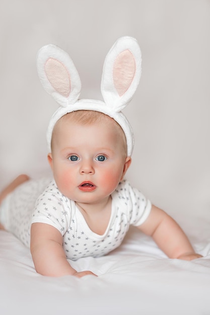 Premium Photo | Cute little baby indoors baby closeup portrait on ...