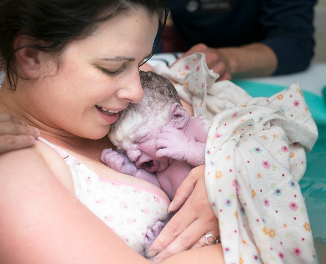 Birth photos of mums holing babies for the first time | Bounty Parents