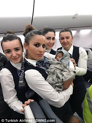 Flight attendants took pictures with a little girl called Kadiju. Photo: Turkish Airlines